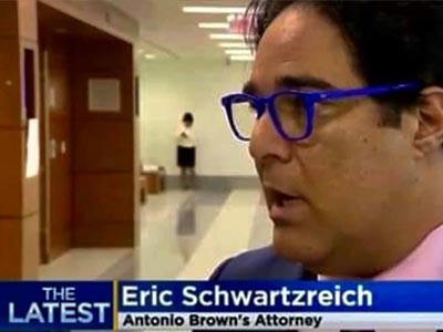 Photo of Eric T. Schwartzreich in an interview
